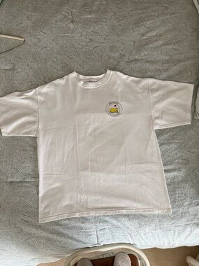Masters Tournament White Short Sleeve Tee with Masters tournament logo.